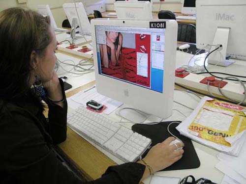 A Graphic Design student at work in the computer lab